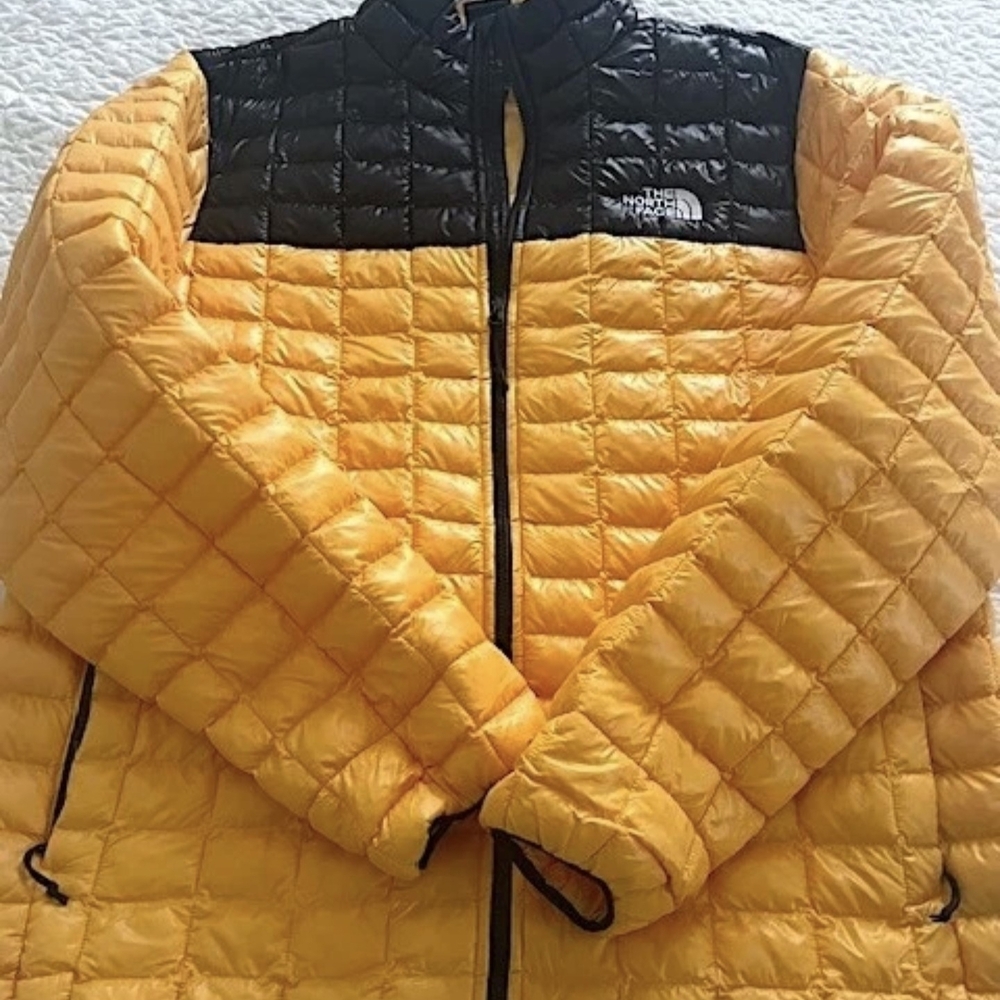 The North Face Men's Thermoball Puffer Jacket in Yellow and Black